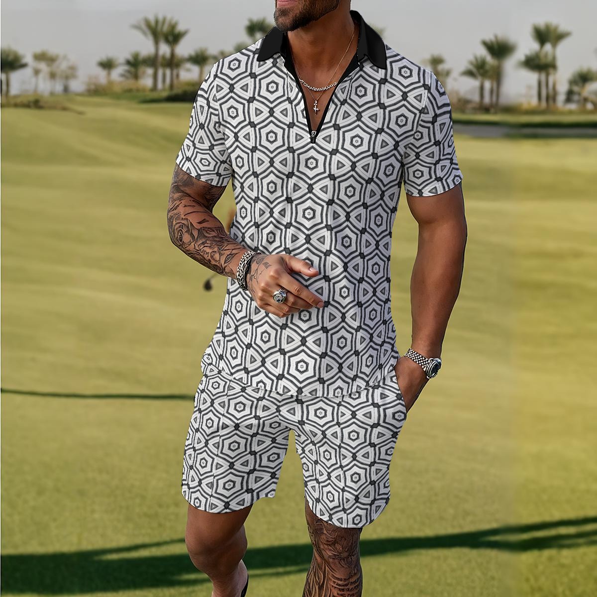 Front view of a black and white geometric print polo shirt